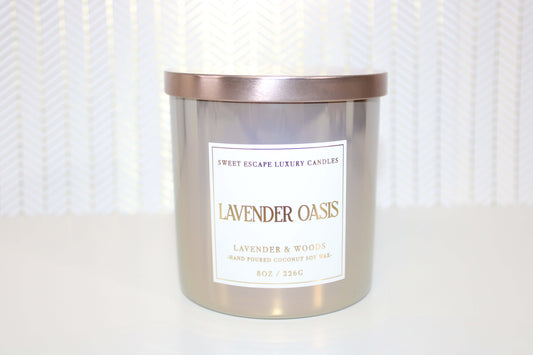 Lavender Oasis Candle by Sweet Escape Luxury Candles, blending timeless lavender with cypress, cedar, and amber. This fresh, woodsy fragrance with a nautical edge creates a balanced and complex scent perfect for home or spa.